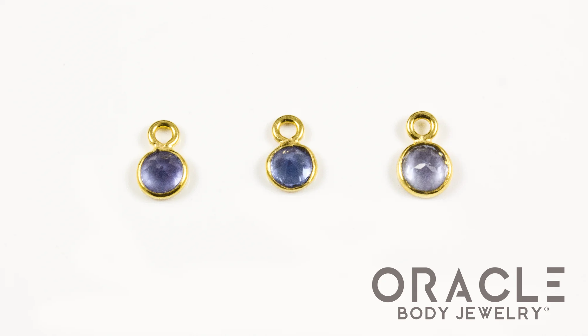 18k Yellow Gold Faceted Tanzanite Charms - Image 2