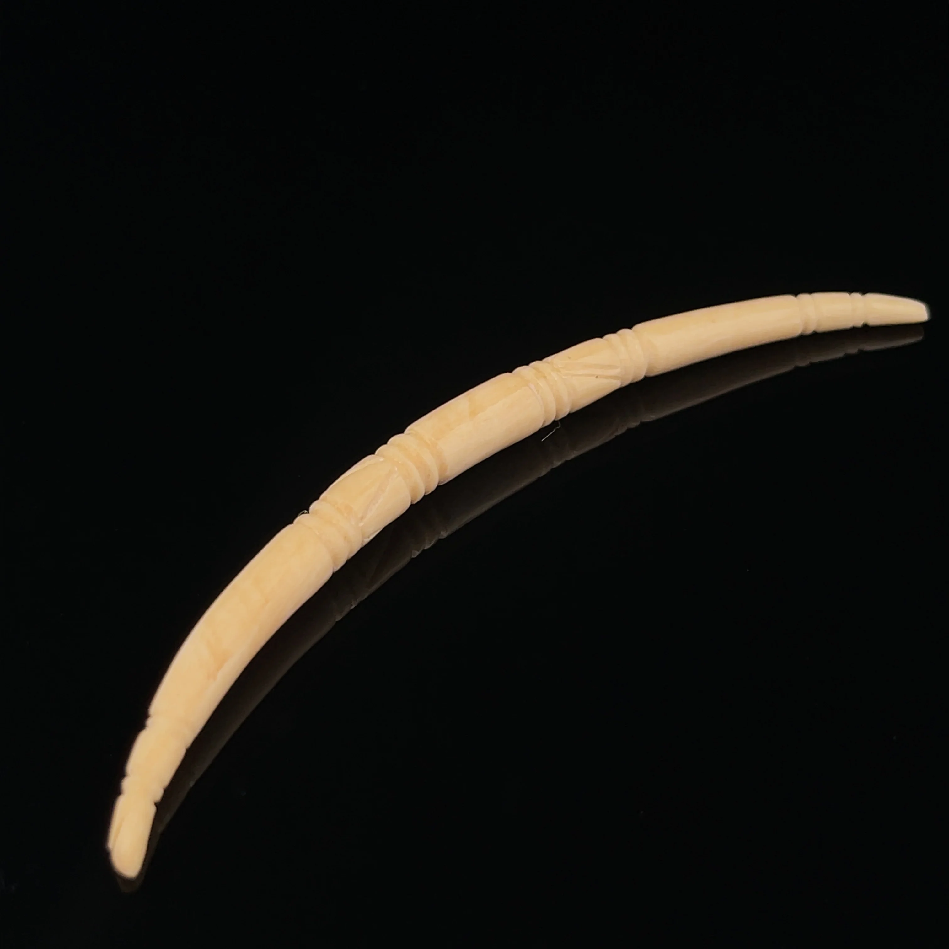 4.8mm Fossilized Mammoth Carved Long Septum Spike - Image 2